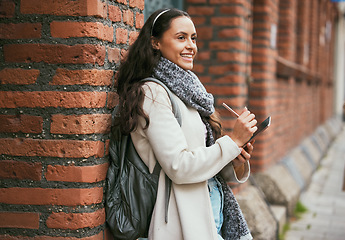 Image showing Tablet, digital writing and travel blog woman journalist working on city street for urban story. Social media, happy and young traveling reporter outdoor from Spain happy about creative job vision