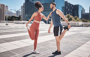 Image showing Fitness, city and couple stretching legs for exercise, health or wellness. Sports runner, diversity or happy man and woman warm up, prepare or getting ready for training or running outdoors on street