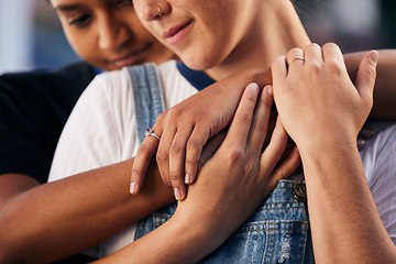 Image showing Hands, love and lgbt with a woman couple hugging outdoor for romance, dating or non binary affection. Hug, date and gay with a gender neutral female and partner sharing an intimate moment together