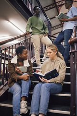 Image showing College student group, stairs and reading for study, research and discussion for exam, test or education. Students team, diversity and books for success, goals and focus at university with teamwork
