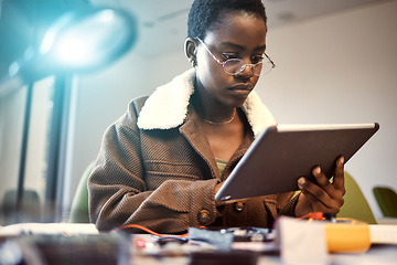 Image showing Student, education and black woman with tablet for learning, knowledge research or studying at home. Technology, digital touchscreen and female internet browsing, social media or networking at night.