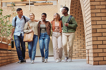 Image showing Walking men, women and people on university, school or college campus to education, diversity learning and study class. Smile, happy and talking students in community support, group trust and bonding