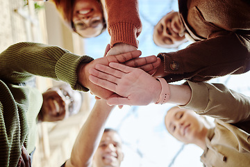 Image showing Below, hands stack and group of students for motivation, support or education in summer sunshine. Diversity, hand together and learning with teamwork, studying or scholarship at university for future