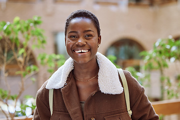 Image showing Happy, smile and portrait of a black woman student standing outdoors at a university in South Africa. Happiness, excited and African female with a positive mindset at college for studying or learning