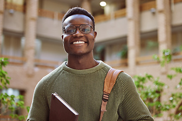 Image showing University student, black man and portrait at campus for education, learning and studying in Atlanta. Happy young male college student with motivation for knowledge, scholarship opportunity and goals