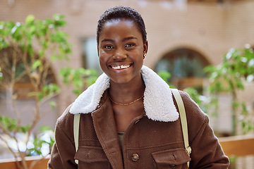 Image showing Happy, portrait and black woman student at college standing in an outdoor garden in South Africa. Happiness, excited and African female with positive mindset at university with education scholarship.