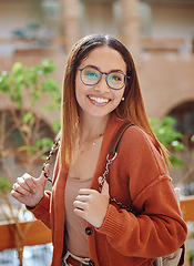 Image showing Smile, woman student and college with education portrait, happy with university and scholarship with learning and study. College student, freedom and academic growth, glasses and geek outdoor