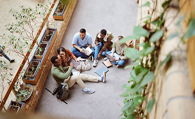 Image showing College group, collaboration and diversity students working on research, university project or education study. Knowledge learning, scholarship teamwork and top view of relax people on school campus