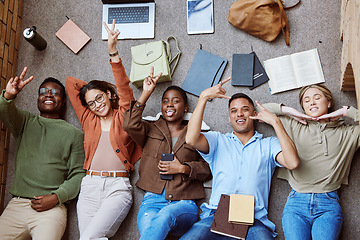 Image showing University floor, diversity portrait and students coworking on group research project, college study or education learning. Knowledge, teamwork and top view of happy exited friends on school campus