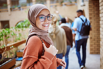 Image showing Portrait, muslim or happy woman on university, school or college campus and education, learning or studying goals. Smile, face or Islamic student with hijab scarf, international scholarship or vision