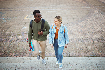 Image showing University, students talking and friends, education and campus, study discussion with walk and talk together with learning. Scholarship, college and communication with black man and woman on steps