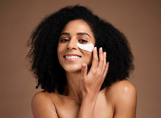 Image showing Beauty, skincare and eye mask with face of black woman for facial, product and spa treatment. Collagen, self care and luxury with girl model and eye patches for wellness, cosmetics and dermatology