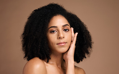 Image showing Face, beauty and hair care with black woman and hair, skincare portrait with microblading, healthy skin and glow mockup. Natural curly hair, hand and cosmetic care, facial against studio background