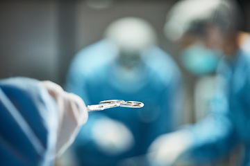 Image showing Hospital tools, surgery and team of doctors in operating room for medical trust, innovation and support with healthcare insurance background. Metal scissors surgeon and nurse helping in a theater