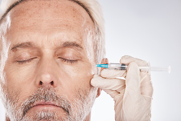 Image showing Man face, hands or cosmetic surgery needle on studio background for skincare collagen, medical dermatology or anti aging grooming. Zoom, plastic surgeon or mature patient injection for facial change