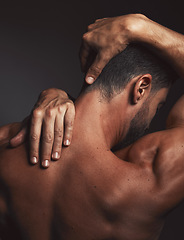 Image showing Stretching, fit man and back muscle on dark black studio background. Self love, self care and model embracing skin, confidence and body positivity with an artistic body hug and creative expression