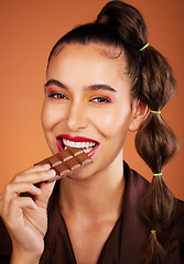 Image showing Chocolate, beauty and portrait girl eating sugar candy, sweets or dark chocolate dessert for stress relief. Skincare, facial cosmetics makeup and model woman face with cacao product for antioxidants