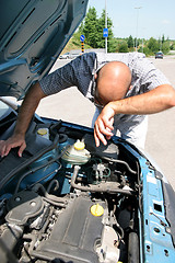 Image showing checking the engine of a car