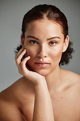 Image showing Black woman, skincare and natural face for beauty cosmetic and glow treatment campaign portrait. Healthy body care of model with beautiful freckles on hydrated skin in gray studio background.