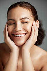 Image showing Face, skincare and makeup with a model black woman in studio on a gray background to promote natural care. Facial, wellness and makeup with an attractive young female happy with her cosmetic product