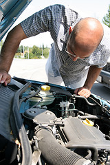 Image showing checking the engine of a car