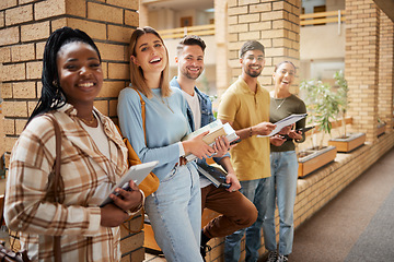 Image showing University, hallway and portrait happy students standing in row together with book, tablet and smile at business school. Friends, education and future, diversity and friendship in college study group