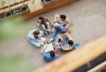 Image showing Study, university group and students on floor for research, project or planning, brainstorming and teamwork. Technology, education and top of college friends or people circle in school collaboration