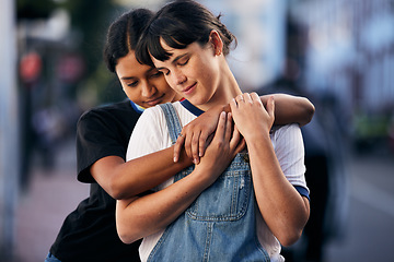 Image showing Support, hug and lgbt couple in the city with peace, freedom and love for identity in France. Pride, calm and lesbian women friends hugging for comfort and relax in lgbtq relationship in the street