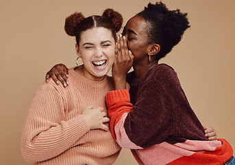 Image showing Friends, gossip and women laughing at secret joke on studio background with smile on face. Secrets, rumor and whisper in ear, black woman with happy woman discuss funny announcement for advertisement