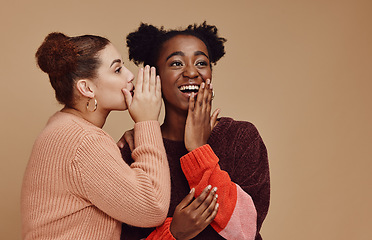 Image showing Friends, gossip and black woman laughing at secret on studio background and product placement mockup. Secrets, rumor and surprise whisper in ear, happy women smile discuss discount sale announcement