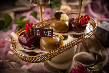 Image showing Still life of heart shaped mini cakes