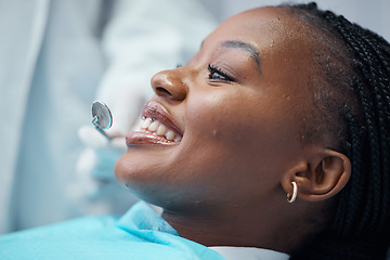 Image showing Face, dental and black woman at dentist, orthodontics tools with teeth cleaning and smile for healthcare check. Health for mouth, teeth whitening and tooth decay with oral hygienist and gum disease