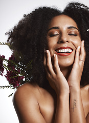 Image showing Peace, skincare and makeup girl with flowers satisfied with beauty and glowing texture routine. Aesthetic, health and wellness of confident black woman with beautiful smile in white studio.