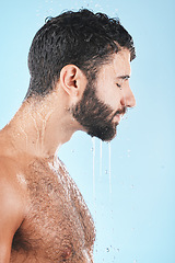 Image showing Water drops, face and man in shower for skincare, cleaning body and hygiene grooming against studio background. Clean, model profile with water and facial, natural treatment and cosmetic care