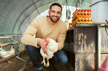 Image showing Chicken farmer, poultry farming and man with animals, smile and happiness while working in the countryside for sustainability. Portrait of farm worker with animal for egg, meat and protein production