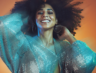 Image showing Beauty, hair and black woman with blur, face and movement with makeup and glitter against studio background. Hair care, natural curly hair and cosmetics with happiness and portrait, disco and fashion