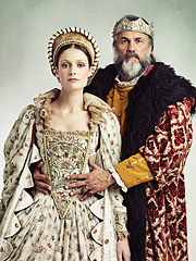 Image showing Costume, portrait and king and queen in crown isolated on studio background for medieval, renaissance and fashion history. Headshot of royal couple hug with power, wealth and vintage culture and love