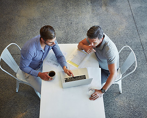 Image showing Teamwork, top view and business people with laptop in office. Collaboration, strategy and workers, men or employees with computer planning advertising, sales or marketing project in company workplace