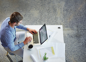 Image showing Top view, business and man with laptop, typing and planning for schedule, project deadline and office. Male employee, ceo and entrepreneur with digital marketing, online research and web launch