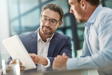 Image showing Tablet, teamwork and meeting of business people in office discussion. Collaboration, technology and men or employees with touchscreen planning sales, marketing or advertising strategy in company.