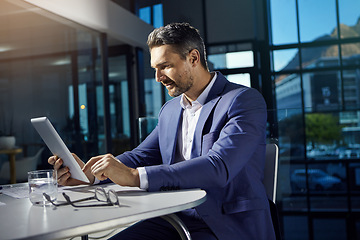 Image showing Technology, modern office and businessman with tablet reading crypto data online. Financial trading, cryptocurrency and investment, man thinking at table with internet research or analytics.