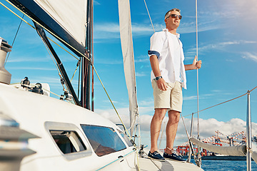 Image showing Sea travel and man on yacht thinking of adventure, holiday and freedom in summer sunshine. Relax, peace and mature guy on luxury boat in Croatia, Europe for retirement lifestyle leisure.