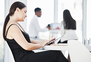 Image showing Woman, corporate office and tablet for reading, planning or schedule at desk with business people. Young executive, mobile touchscreen tech and relax on break with social network, web video or ebook