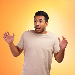 Image showing Man, surprised and standing isolated on a yellow background in shock for surprise. Shocked young male looking amazed, wow or OMG expression for deal, win or achievement against a studio background