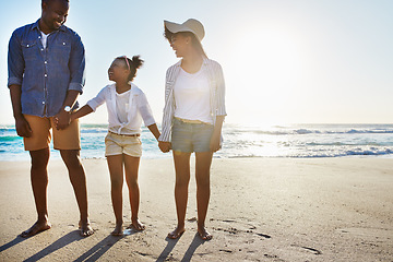 Image showing Black family, mother and father with girl, beach and vacation for summer, weekend break and bonding. Love, parents and daughter on seaside holiday, sand and happiness for traveling and holding hands