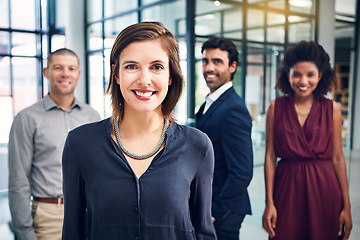 Image showing Business woman, happy and leader portrait while in a office with management team for growth. Face of corporate female entrepreneur for diversity, motivation and vision for innovation in a workplace