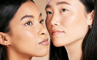 Image showing Face, beauty and diversity with model woman friends closeup in studio on a beige background. Skincare, facial or cosmetics with an attractive young female and friend posing to promote a skin product