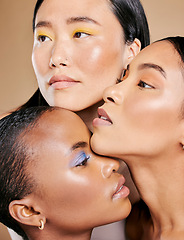 Image showing Beauty, diversity and face of women with makeup for creativity isolated on studio background. Skincare, cosmetology and model friends with facial cosmetics foundation in different shades on backdrop