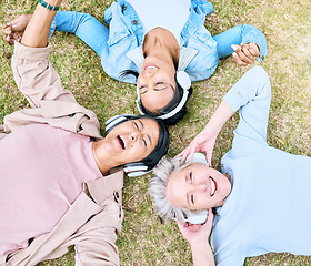 Image showing Top view, senior or women and music headphones in silent disco, retirement fun or bonding community wellness. Smile, happy or elderly friends lying on grass or listening to radio in relax nature park