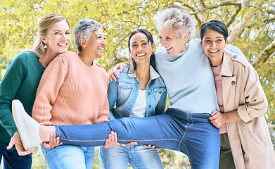 Image showing Senior women, portrait and silly fun in bonding, comic games and goofy energy activity in nature park, garden and environment. Smile, happy and diversity elderly friends in retirement community group